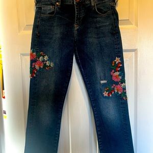 Anthropologie jeans. Size 27, mid-rise, embroidery on each leg.
